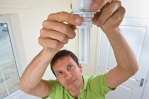 man putting a light