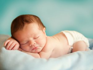 Sleeping little newborn baby boy