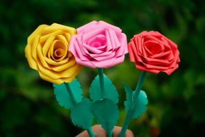 yellow, pink, and red paper roses