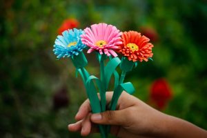 blue, pink, and red paper flowers